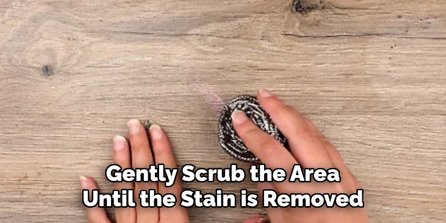 Gently Scrub the Area Until the Stain is Removed