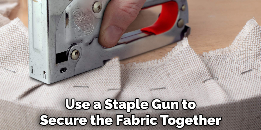 Use a Staple Gun to Secure the Fabric Together