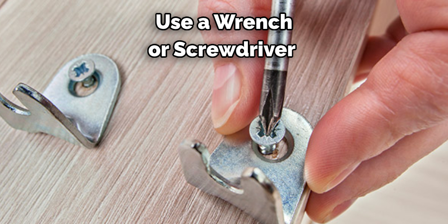 Use a Wrench or Screwdriver 