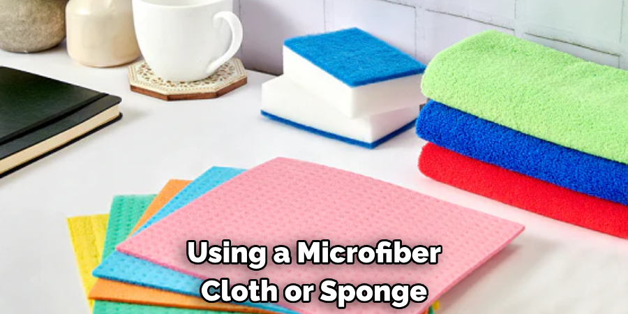 Using a Microfiber Cloth or Sponge
