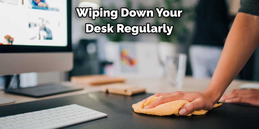 Wiping Down Your Desk Regularly 