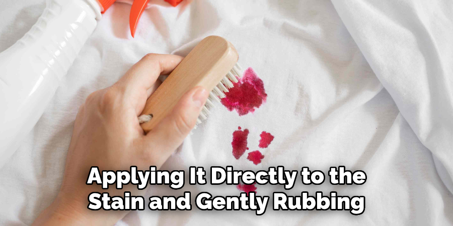 Applying It Directly to the Stain and Gently Rubbing