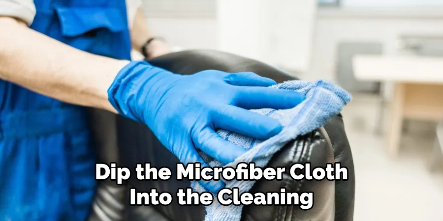 Dip the Microfiber Cloth Into the Cleaning