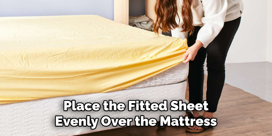 Place the Fitted Sheet Evenly Over the Mattress