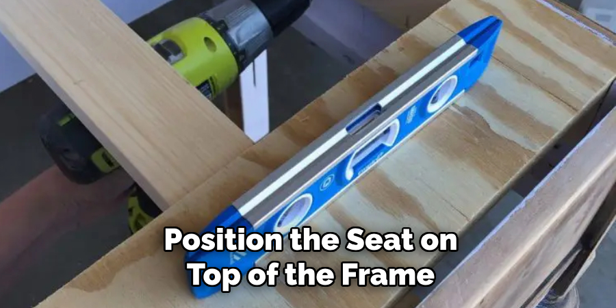 Position the Seat on Top of the Frame