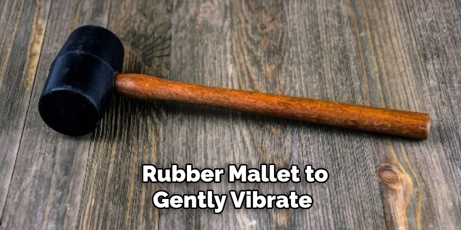 Rubber Mallet to Gently Vibrate 