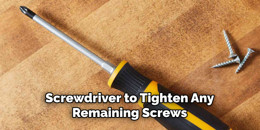 Screwdriver to Tighten Any Remaining Screws 