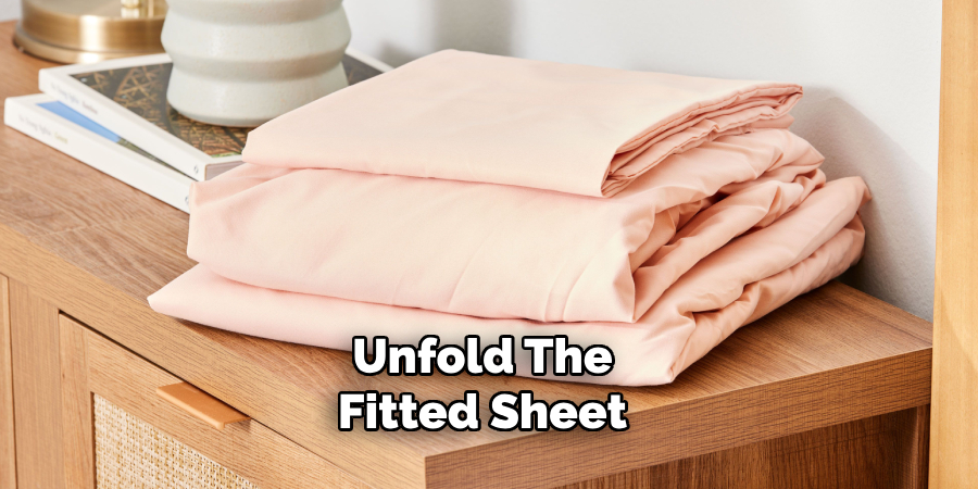 Unfold the Fitted Sheet 