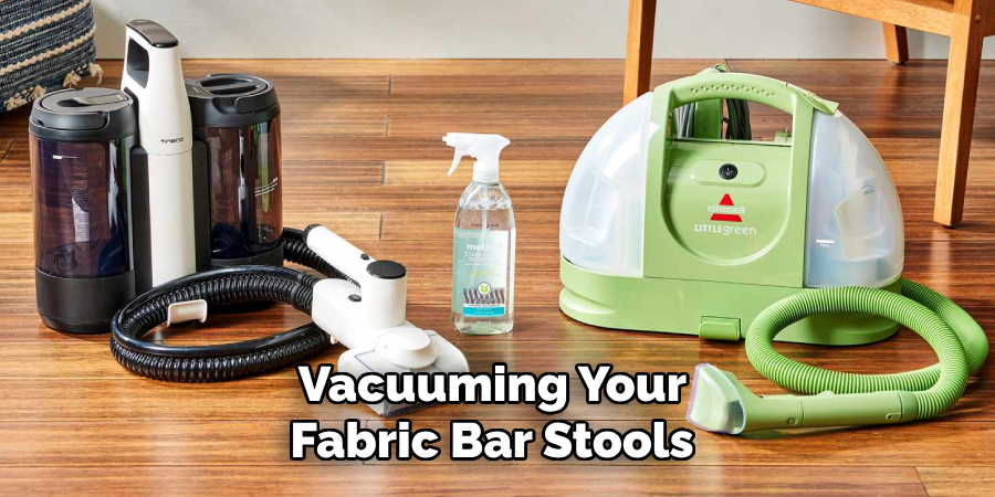 Vacuuming your fabric bar stools