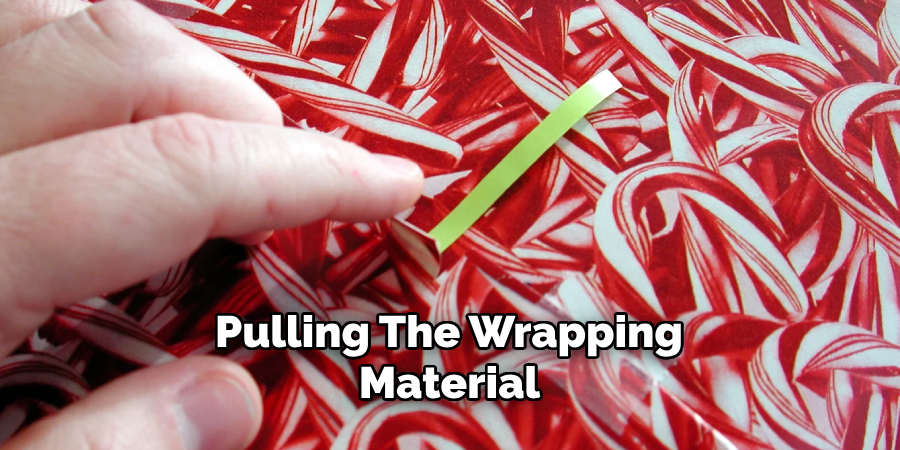 Pulling the Wrapping Material 