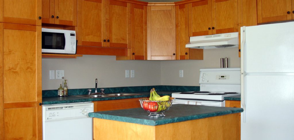 How to Tone Down Orange Maple Cabinets