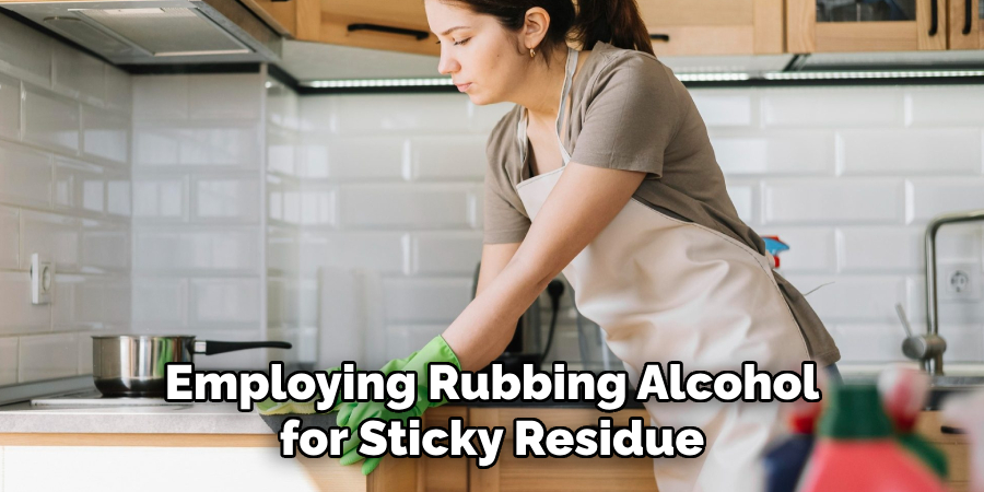 Employing Rubbing Alcohol for Sticky Residue