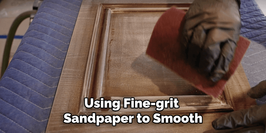Using Fine-grit Sandpaper to Smooth