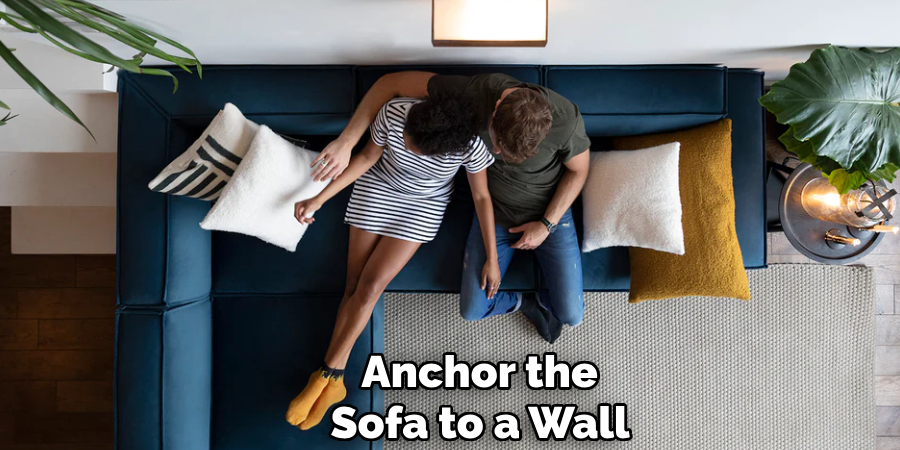 Anchor the
Sofa to a Wall
