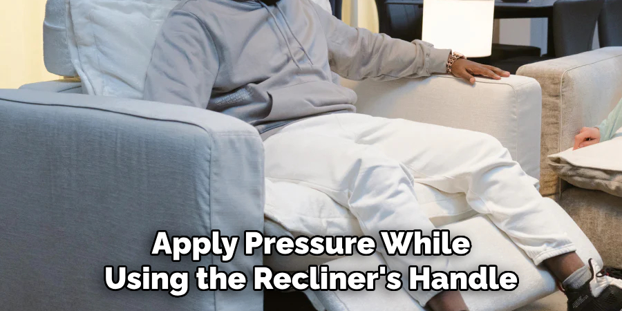 Apply Pressure While Using the Recliner's Handle