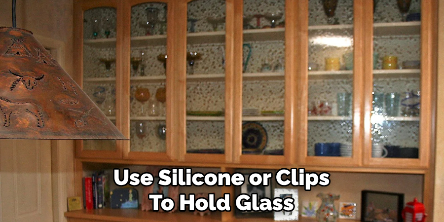 Use Silicone or Clips 
To Hold Glass 