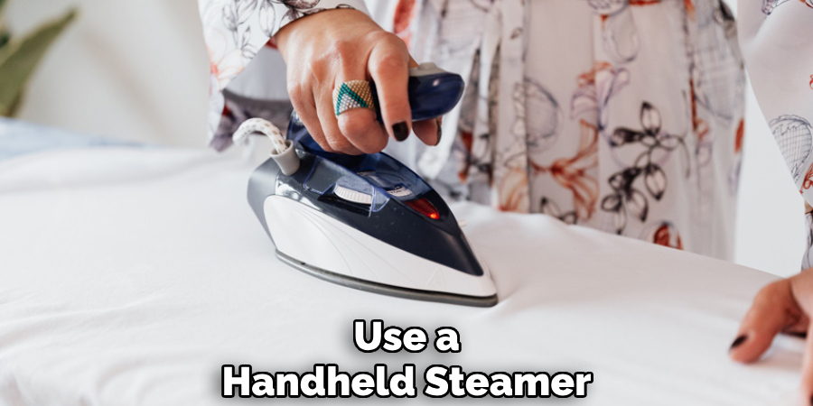 Use a 
Handheld Steamer  