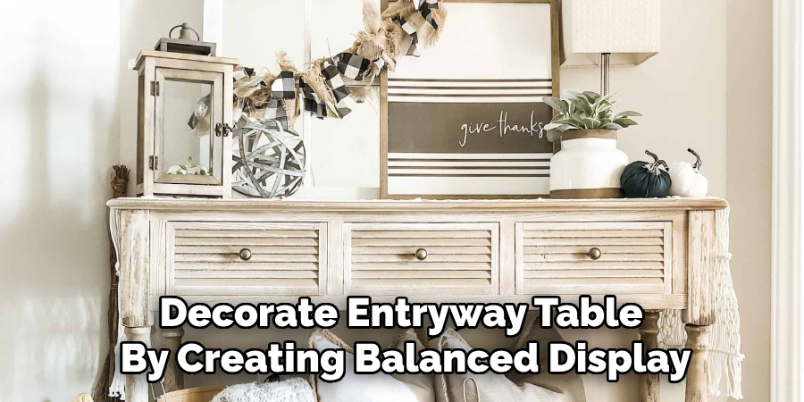 Decorate Entryway Table 
By Creating Balanced Display