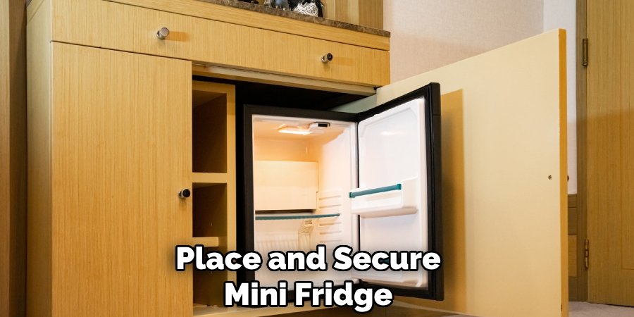 Place and Secure 
Mini Fridge