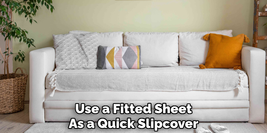 Use a Fitted Sheet
As a Quick Slipcover
