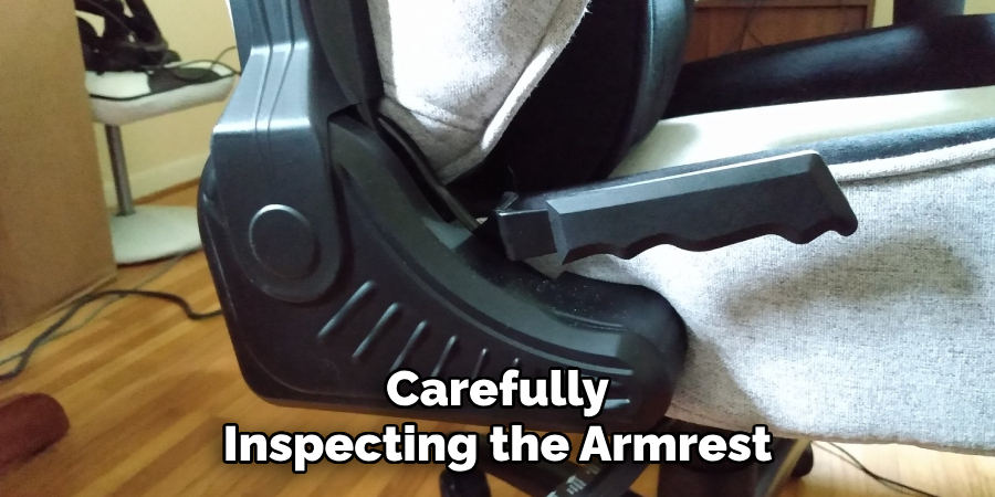 Carefully Inspecting the Armrest