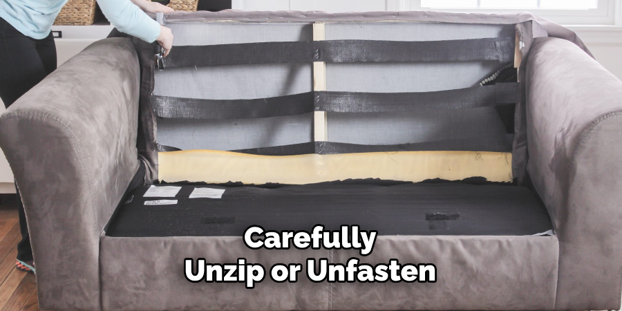 Carefully Unzip or Unfasten
