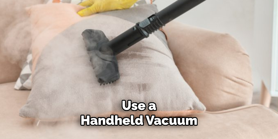Use a Handheld Vacuum