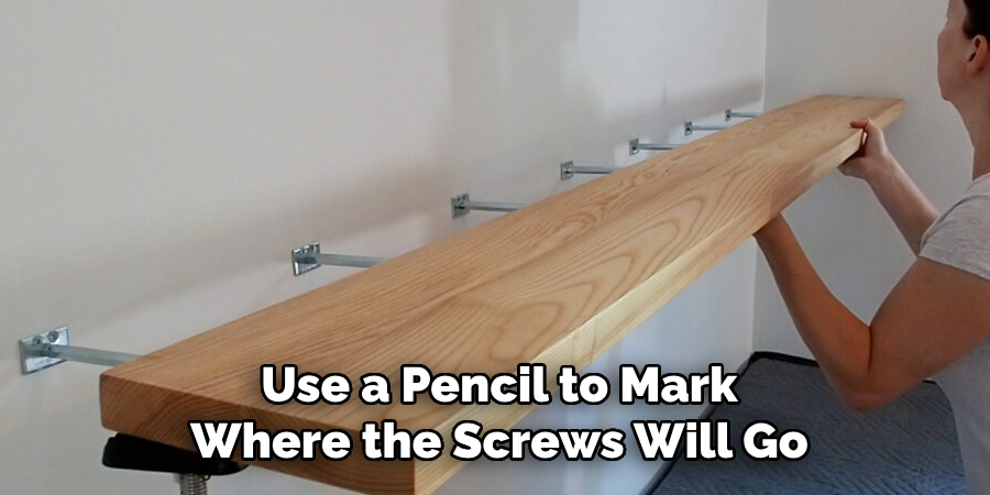 Use a Pencil to Mark Where the Screws Will Go