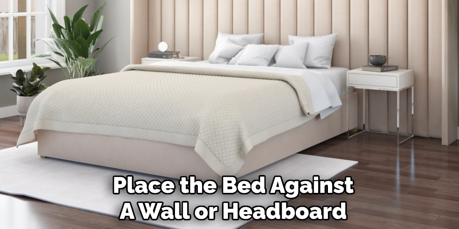Place the Bed Against
A Wall or Headboard