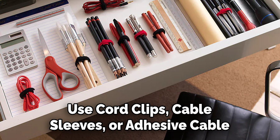 Use Cord Clips, Cable Sleeves, or Adhesive Cable