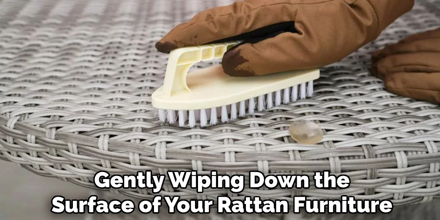 Gently Wiping Down the
Surface of Your Rattan Furniture