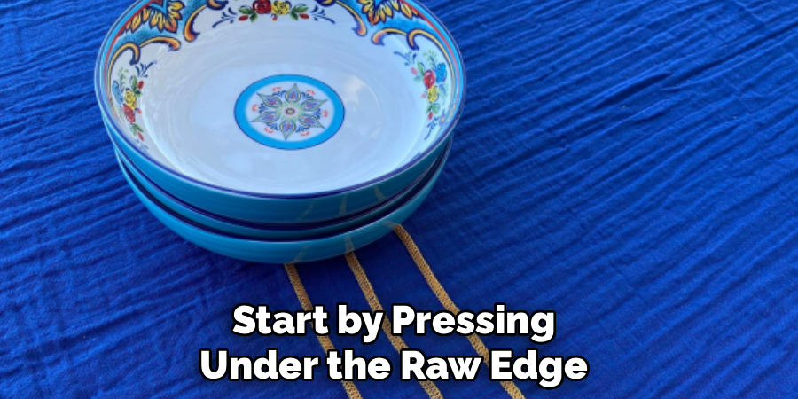 Start by Pressing
Under the Raw Edge