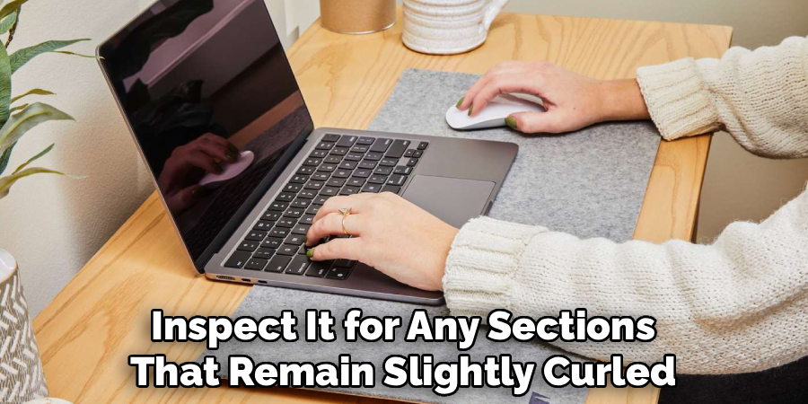 Inspect It for Any Sections
That Remain Slightly Curled