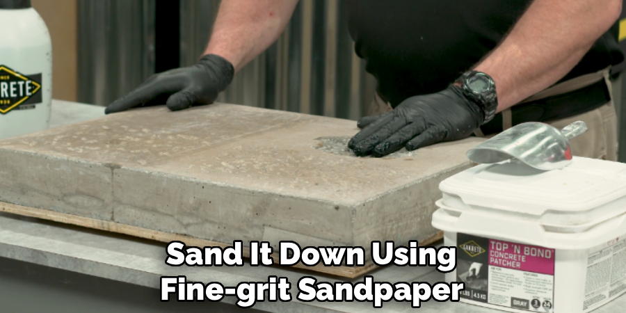 Sand It Down Using
Fine-grit Sandpaper
